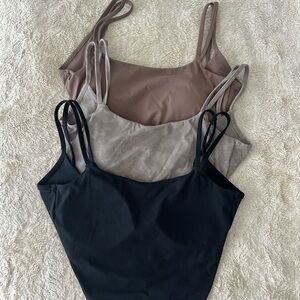 Black, Beige, and Brown Tops